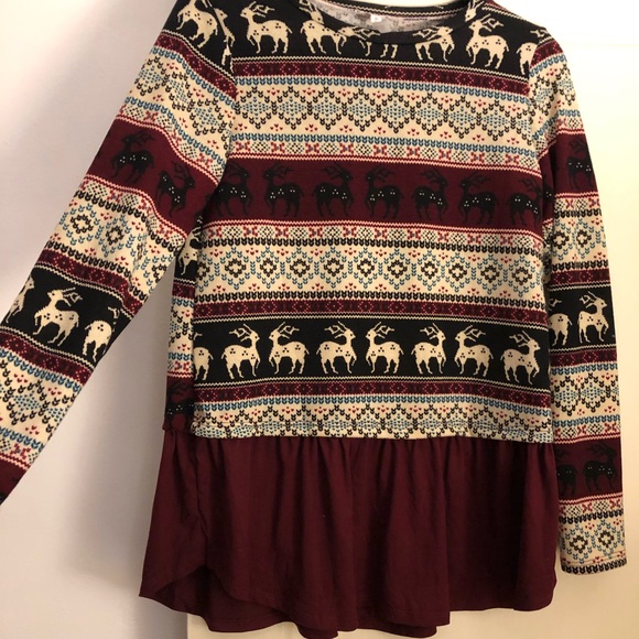 Never worn reindeer sweater with solid peplum. - Picture 1 of 3